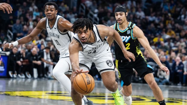  Brooklyn Nets guard Cam Thomas (24) dribbles the ball past Indiana Pacers guard Andrew Nembhard (2) 